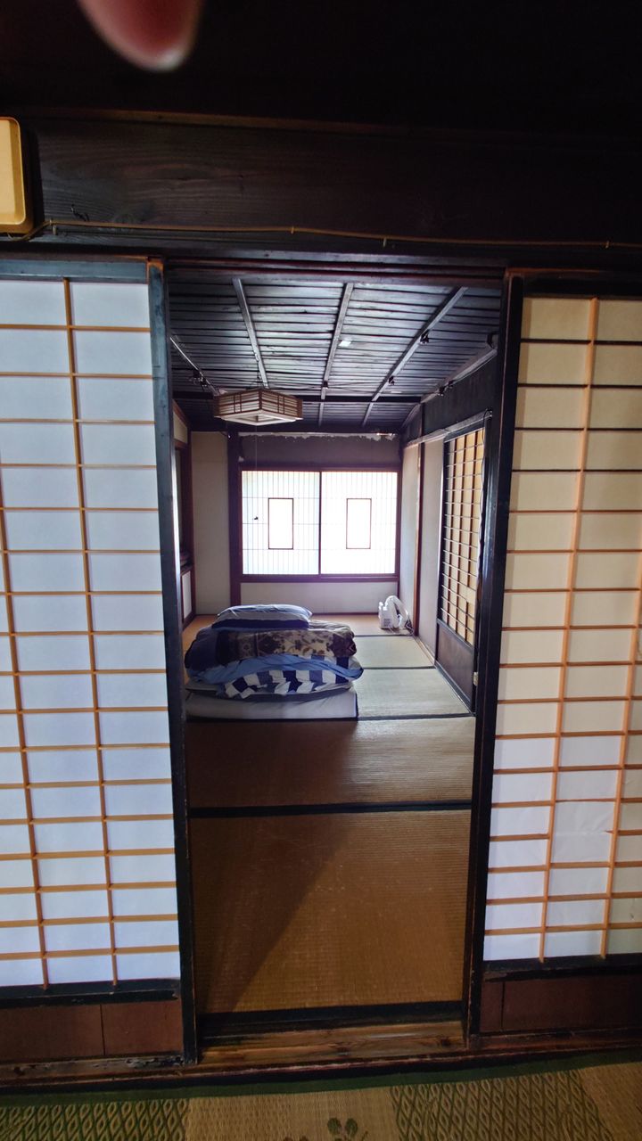 Kominka staircase through shoji